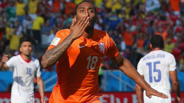 Leroy Fer celebrates scoring for the Netherlands against Chile at the World Cup