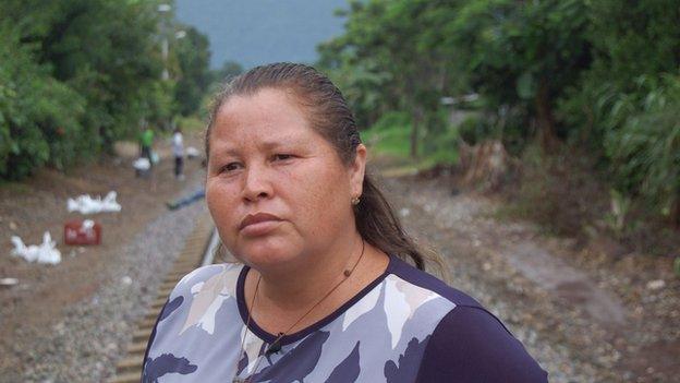 Norma Romero stands on the railway tracks in June 2014