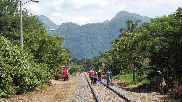 Las Patronas walk along the railway track in June 2014