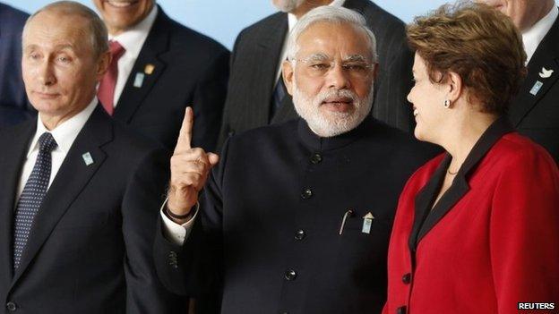 PM Narendra Modi (C) with Russian President Vladimir Putin and Brazil's President Dilma Rousseff (R) at the 6th BRICS summit in Brasilia July 16, 2014