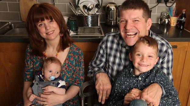 Laurence with his wife and two kids