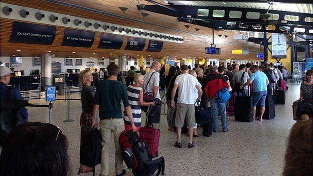 Check in queue at Guernsey Airport