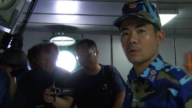 Lieutenant-colonel Ngo Minh Tung (right), a commander of the Vietnamese Coast Guard Zone 1, briefed reporters.