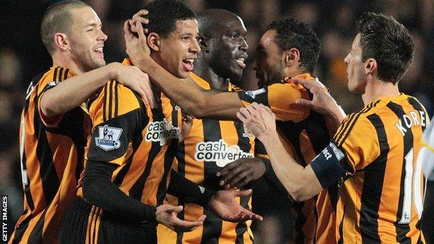 Hull players celebrate a goal