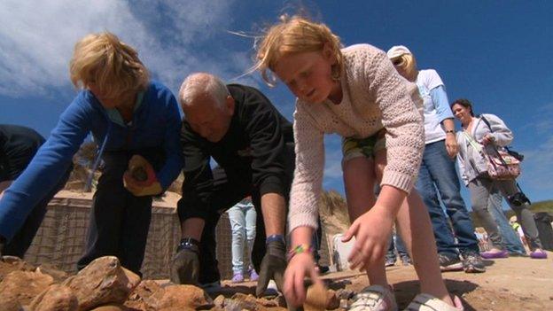 Volunteers work on the sea defences at Hemsby