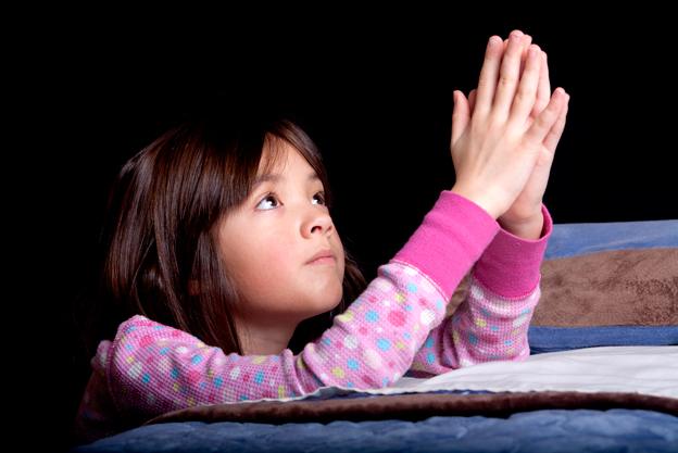 Young girl praying