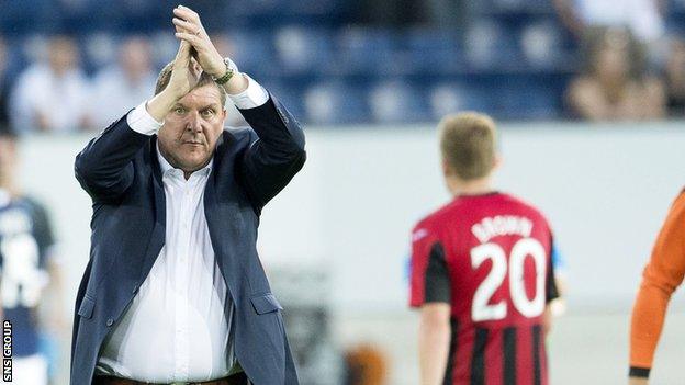 Tommy Wright applauds the 800 or so travelling St Johnstone supporters