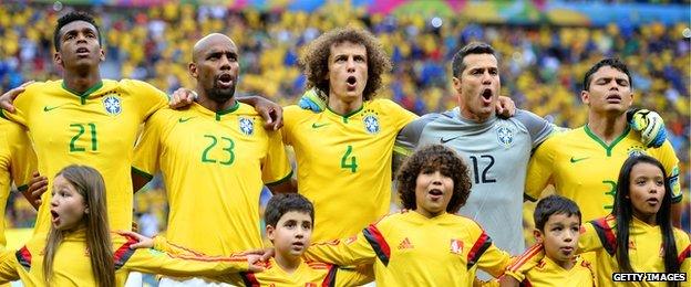 Brazilian players sing the national anthem in Brasilia on 12 July