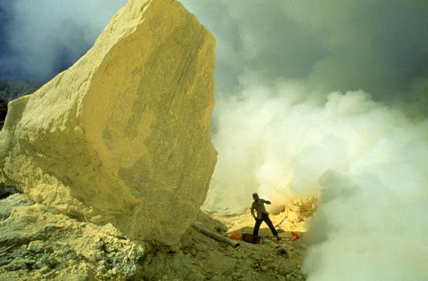 Sulphur fumes emanating from a crater in an active volcano on Java, Indonesia