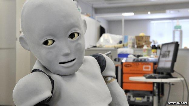 A child-sized robot in a Japanese laboratory.