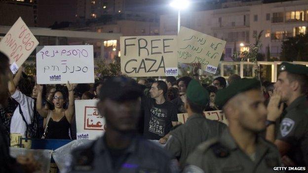 Israeli protesters take part in a protest against Israel's military operation in the Gaza Strip in Tel Aviv, Israel, 19 July 2014