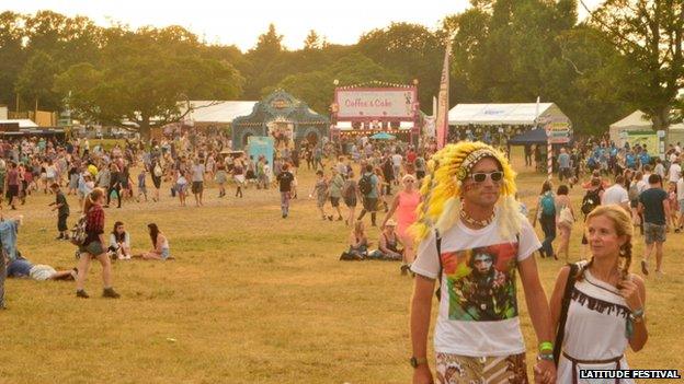 Dusk falls over festival-goers