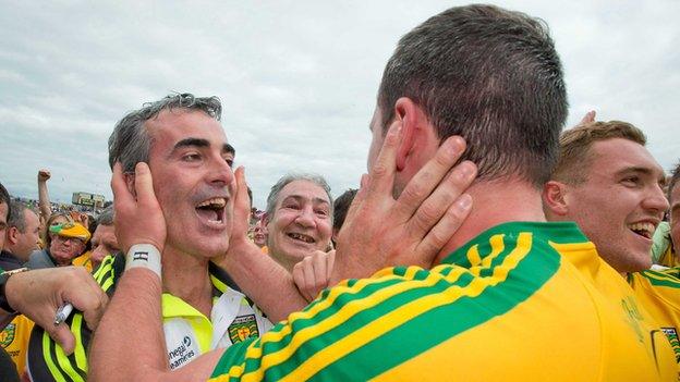 Jim McGuinness embraces his Donegal captain Michael Murphy after the county's Ulster Final triumph