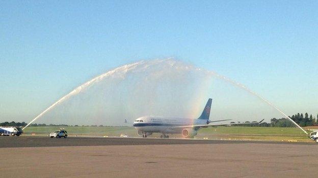 water squirting over aeroplane