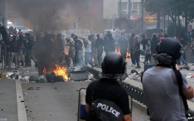 Youths looted shops and burned cars during the banned pro-Palestinian rally in Sarcelles on Sunday