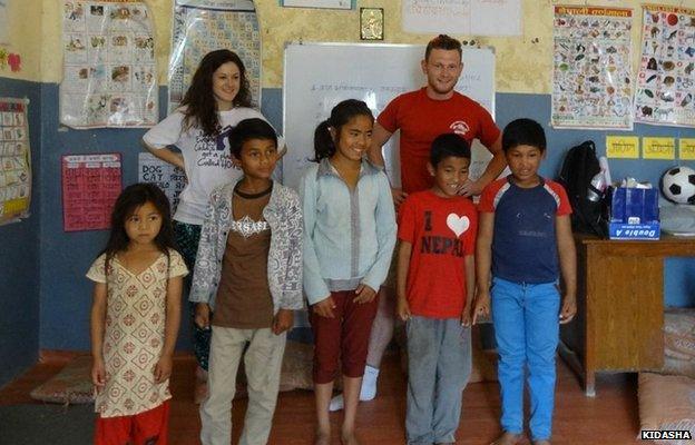 Richard Mayne with children in Nepal