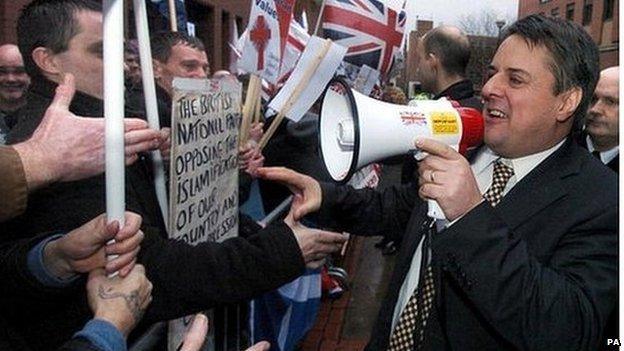 Nick Griffin greets supporters before going on trial on race hate charges in 2006