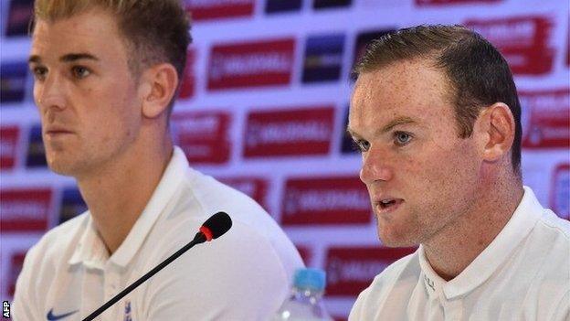 Joe Hart and Wayne Rooney