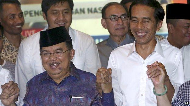 Joko Widodo, right, and running-mate Jusuf Kalla celebrates election win. 22 July 2014