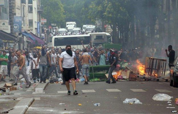 Rioters face police in Barbes, Paris, 20 July