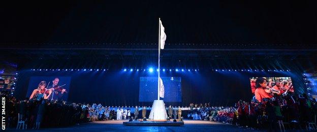 The Commonwealth flag is raised during the opening ceremony of the 2014 Commonwealth Games