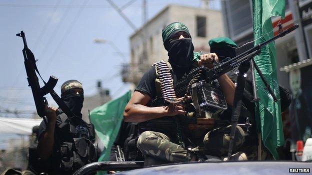 Palestinian members of Hamas" armed wing take part in the funeral of their comrades in Gaza City June 21, 2014