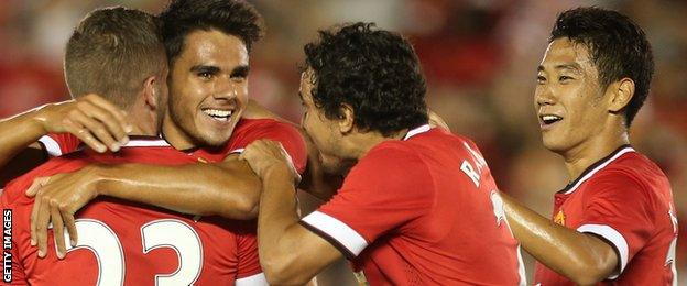 Debutant defender Reece James is congratulated by his Man Utd team-mates after scoring