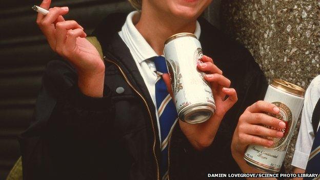 School children smoking and drinking