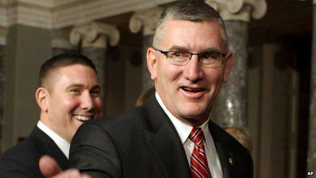 US Senator John Walsh of Montana walks through the US Capitol building.