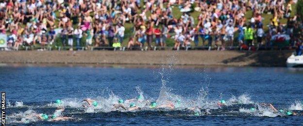 Competitors take to the water in the men's triathlon at Strathclyde Park