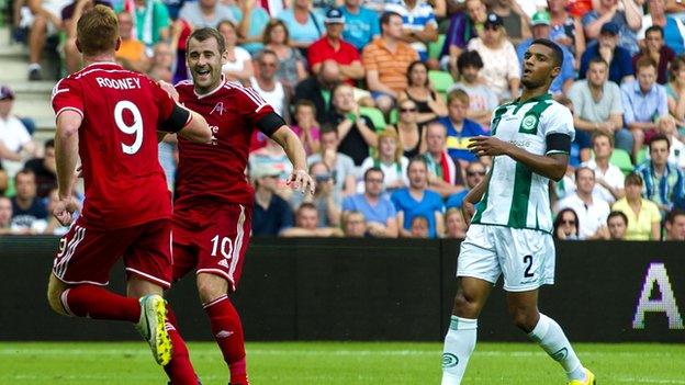 Niall McGinn celebrates after netting Aberdeen's second goal against Groningen