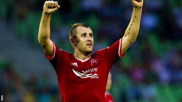 Niall McGinn celebrates after Aberdeen beat Groningen