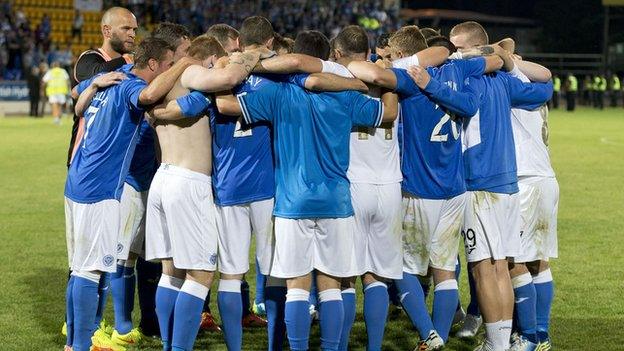 St Johnstone players go in to a huddle after securing their place in the next round of the Europa League