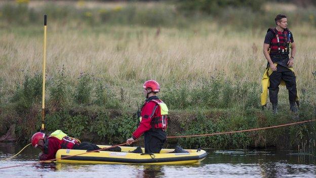 Rescue workers on the river at Hartford