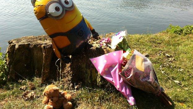 Tributes left on riverbank