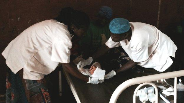 Staff at Bambari University Hospital treating a patient