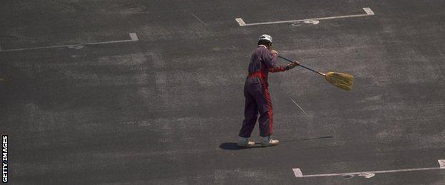 The track is swept clean of debris before the Mexican Grand Prix at the Mexico City circuit