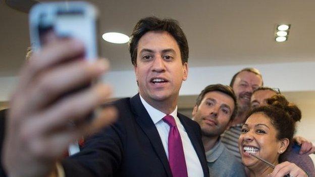 Ed Miliband takes a selfie at a Cambridge hairdressers