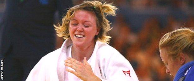 Megan Fletcher after beating New Zealand's Moira de Villiers in the women's -70kg