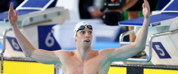 Scotland's Dan Wallace celebrates winning gold in the 400m individual medley at the Commonwealth Games.