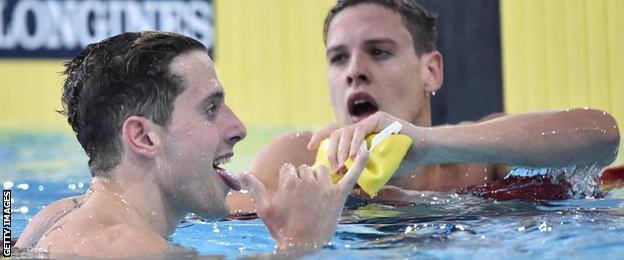 Chris Walker-Hebborn celebrates winning the 100m backstroke at the Commonwealth Games