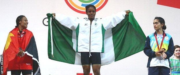 Silver medalist Dika Toua of Papa New Guinea, Gold medalist Chika Amalaha of Nigeria and Bronze medalist Santoshi Matsu of India