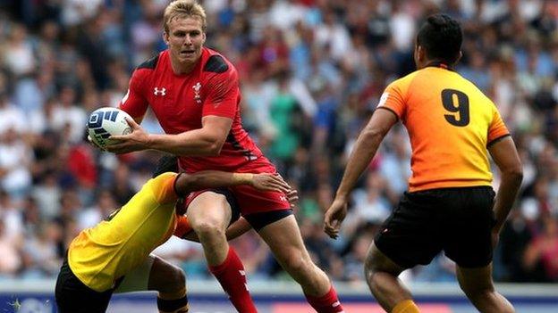 Jevon Groves in action for Wales against Malaysia.