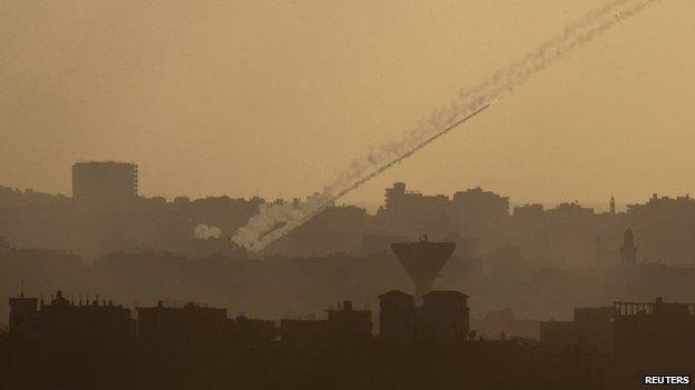 A rocket is seen as it is fired from the northern Gaza Strip towards Israel, 25 July 2014