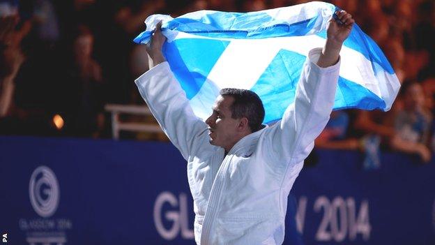 Scotland's Euan Burton after winning Commonwealth Games gold in the -100kg class