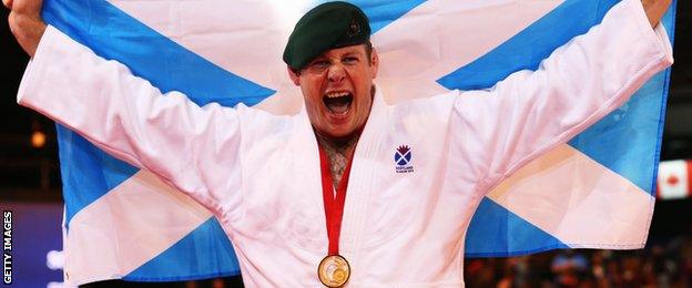 Chris Sherrington celebrates his gold medal in the +100kg