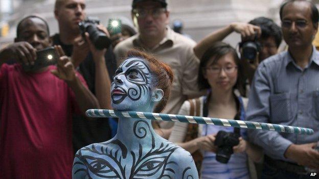 Painted model with hula hoop