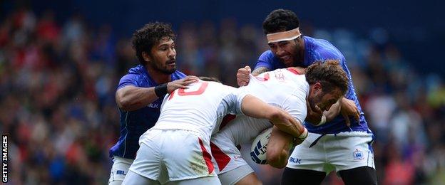 England are tackels by Samoa