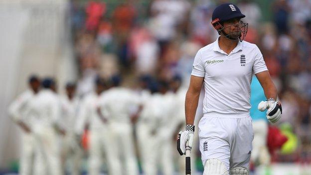 England captain Alastair Cook walks off