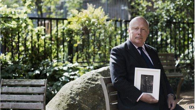 Lord Julian Fellowes with a picture of his great uncle Hamilton Stephenson